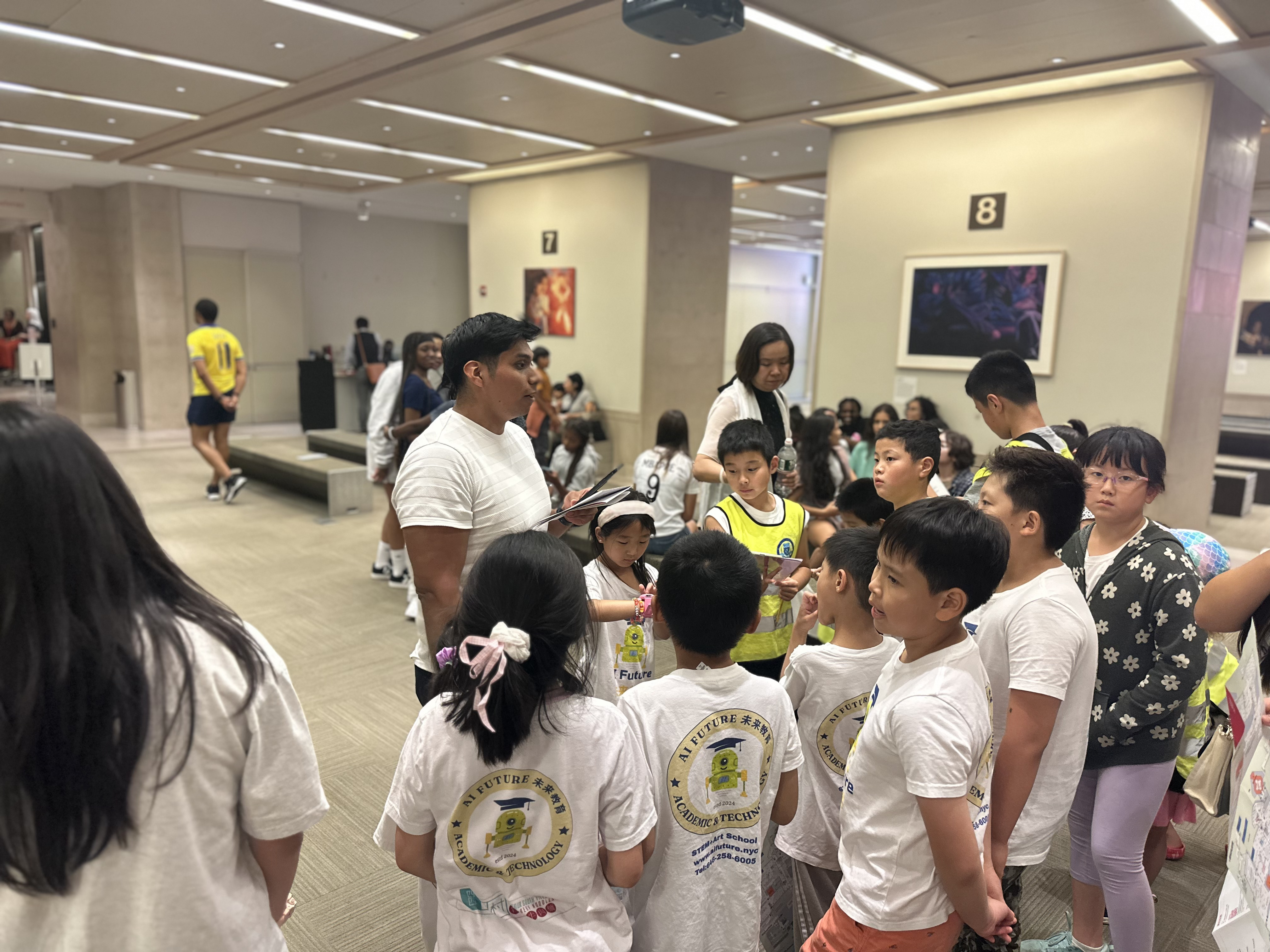 Students learning robotics and engineering at AI Future summer camp